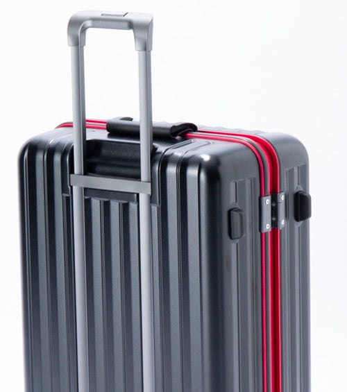 このキャリーバーシステムはスーツケースの外部に直接取り付けられています。